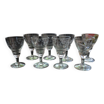 8 small old chiseled glasses