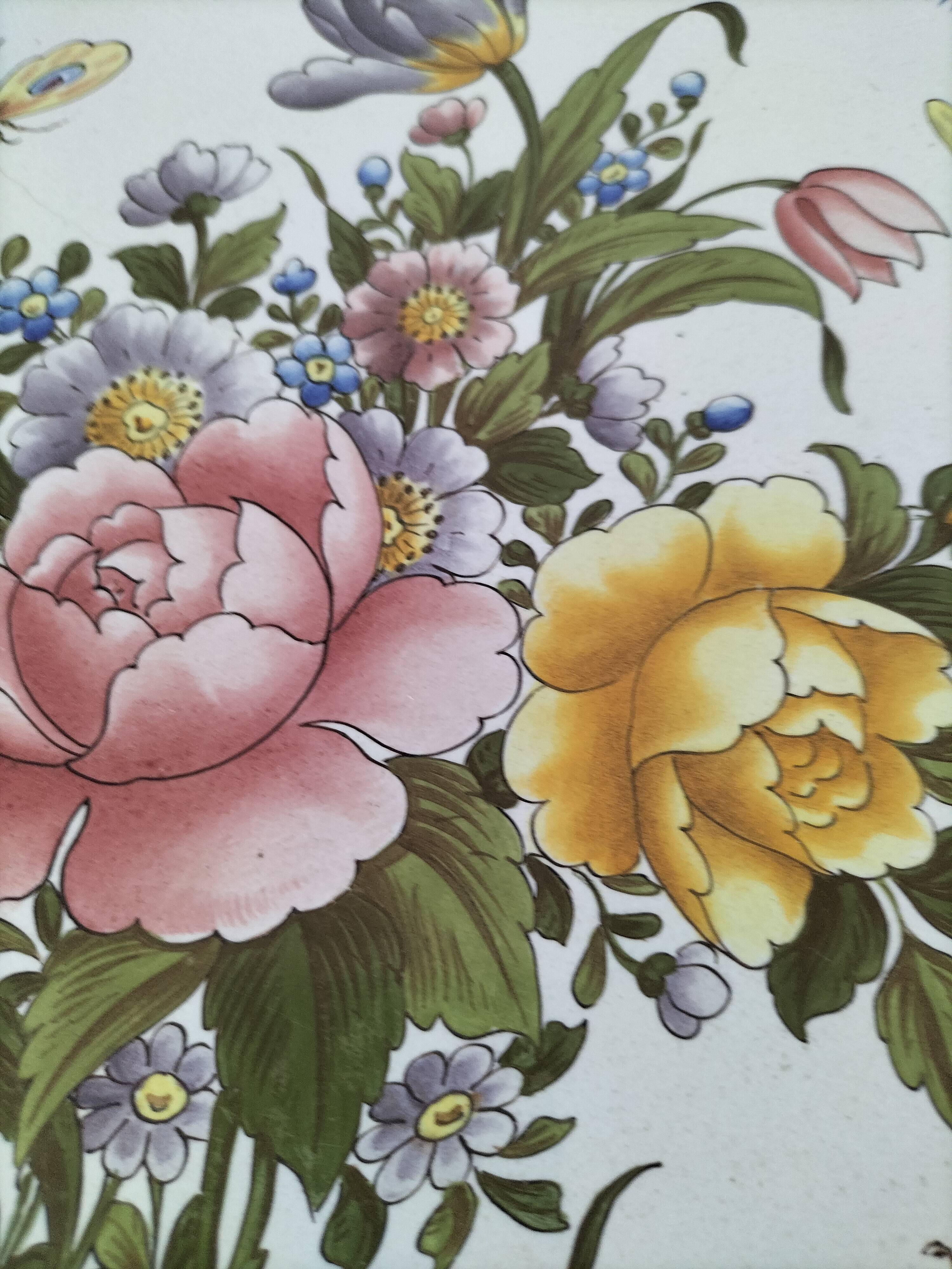 Decorative earthenware plate signed Charolles