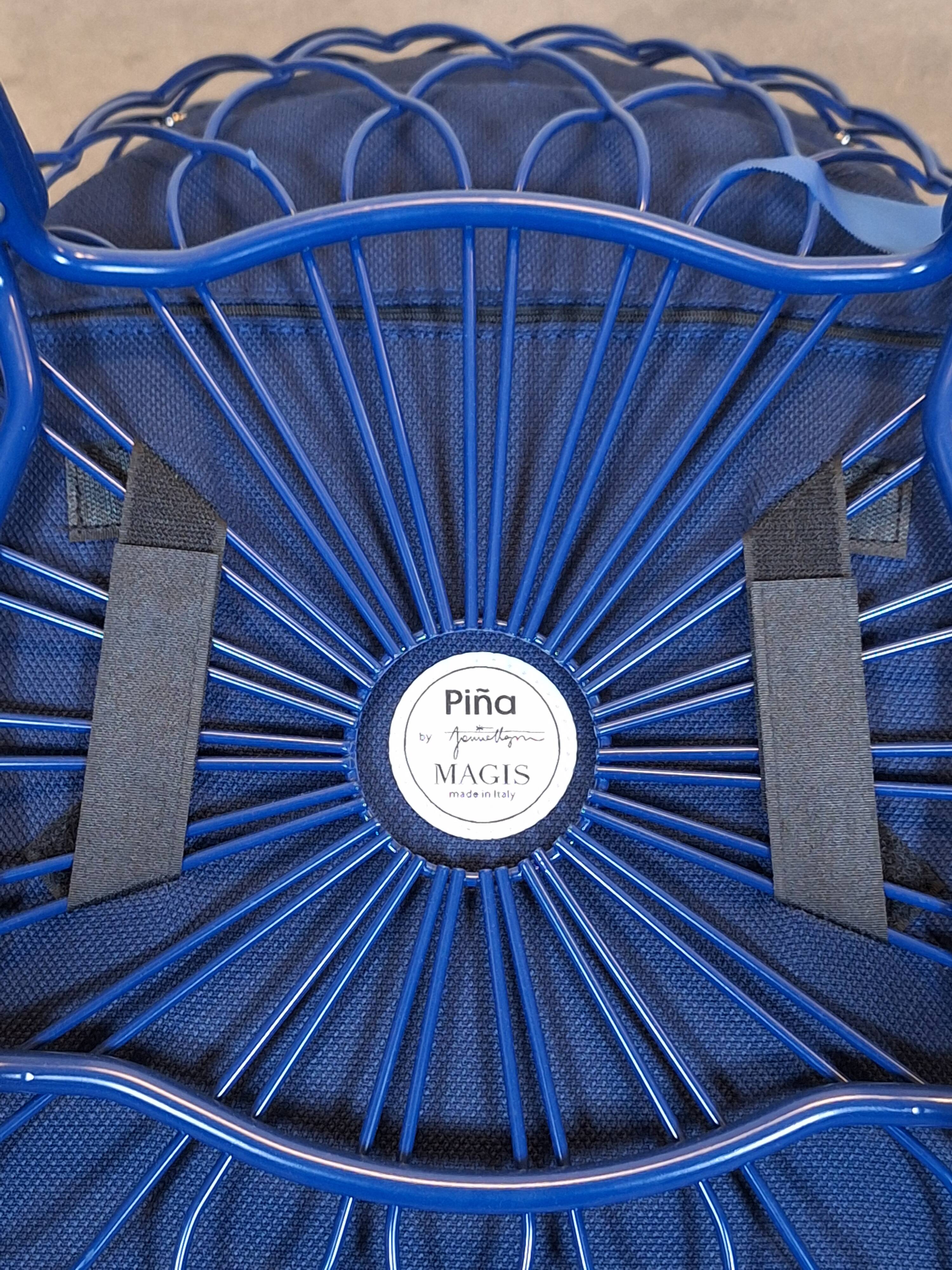 Magis Piña blue chair with metal frame and padded seat