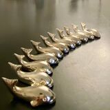 11 whale-shaped metal knife holders