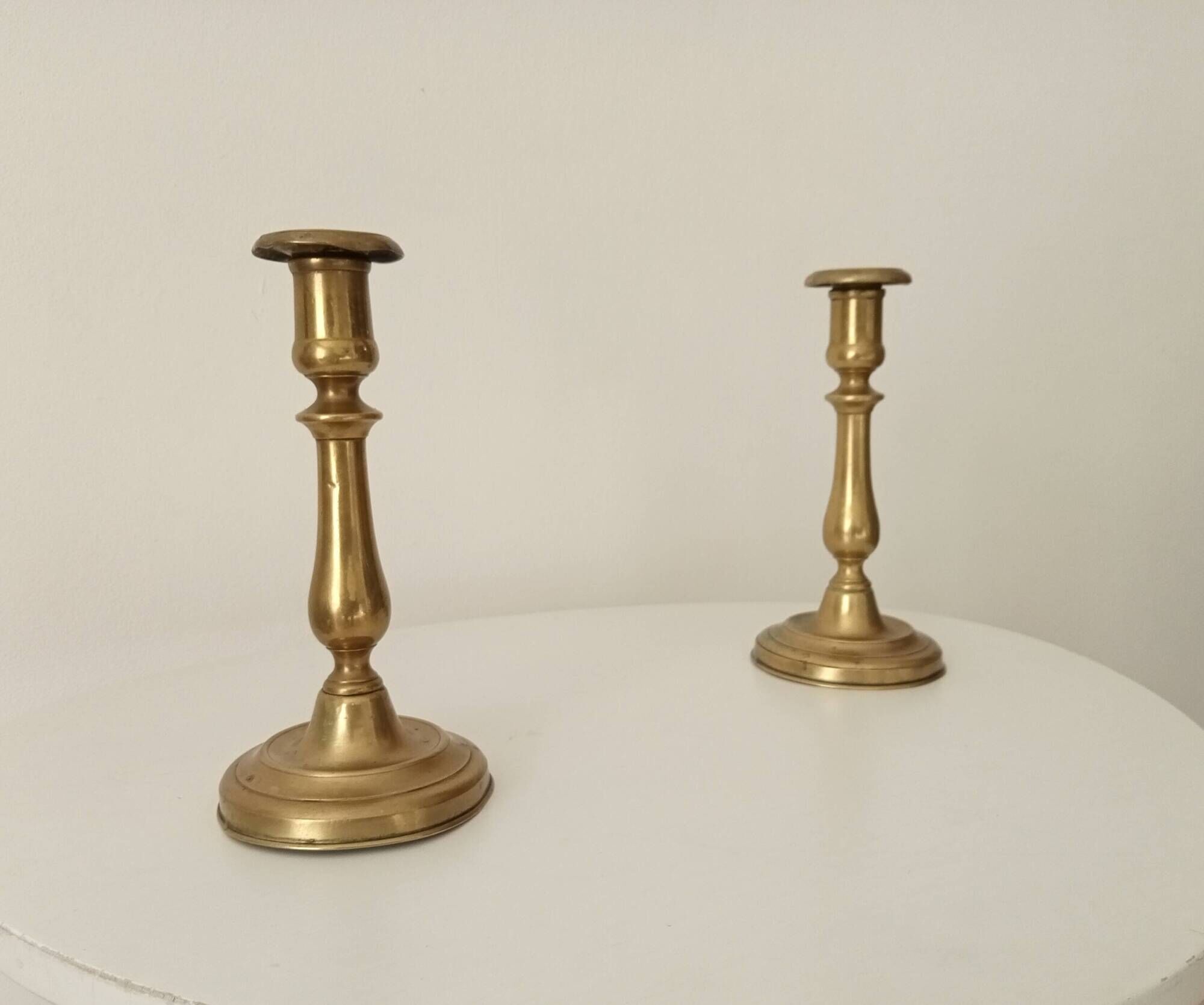 Pair of old candlesticks in solid gilded brass
