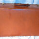 Old vintage black and white cardboard storage suitcase travel