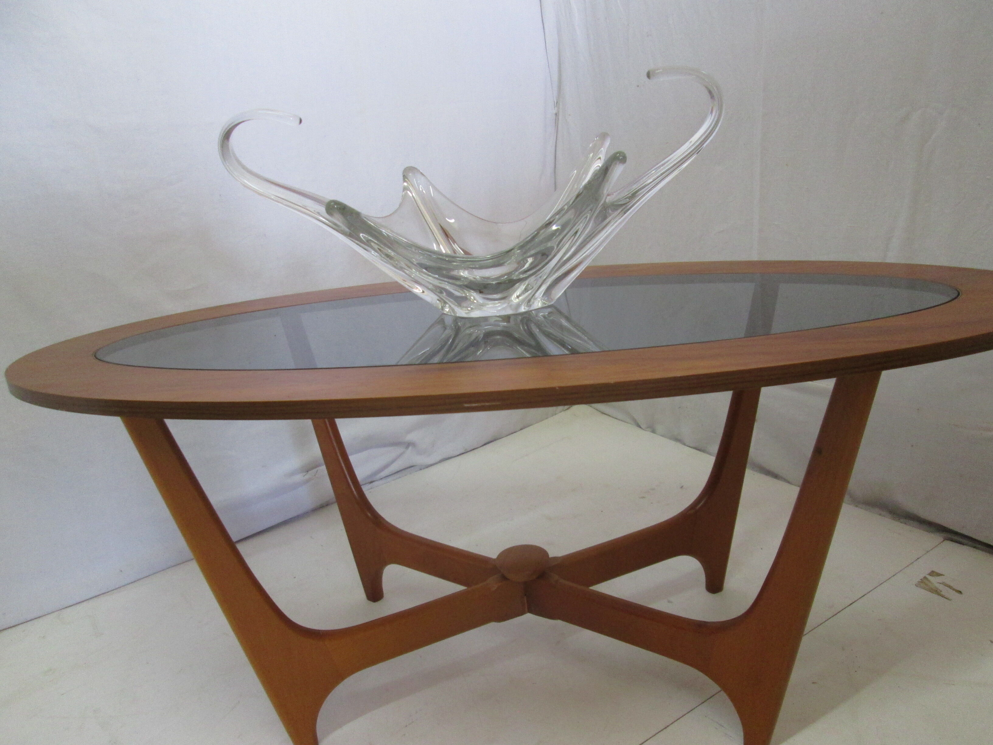 Oval teak coffee table