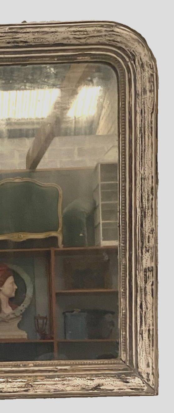 Louis Philippe mirror in wood and patinated stucco 19th century