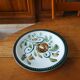 5 plates, mismatched dishes
