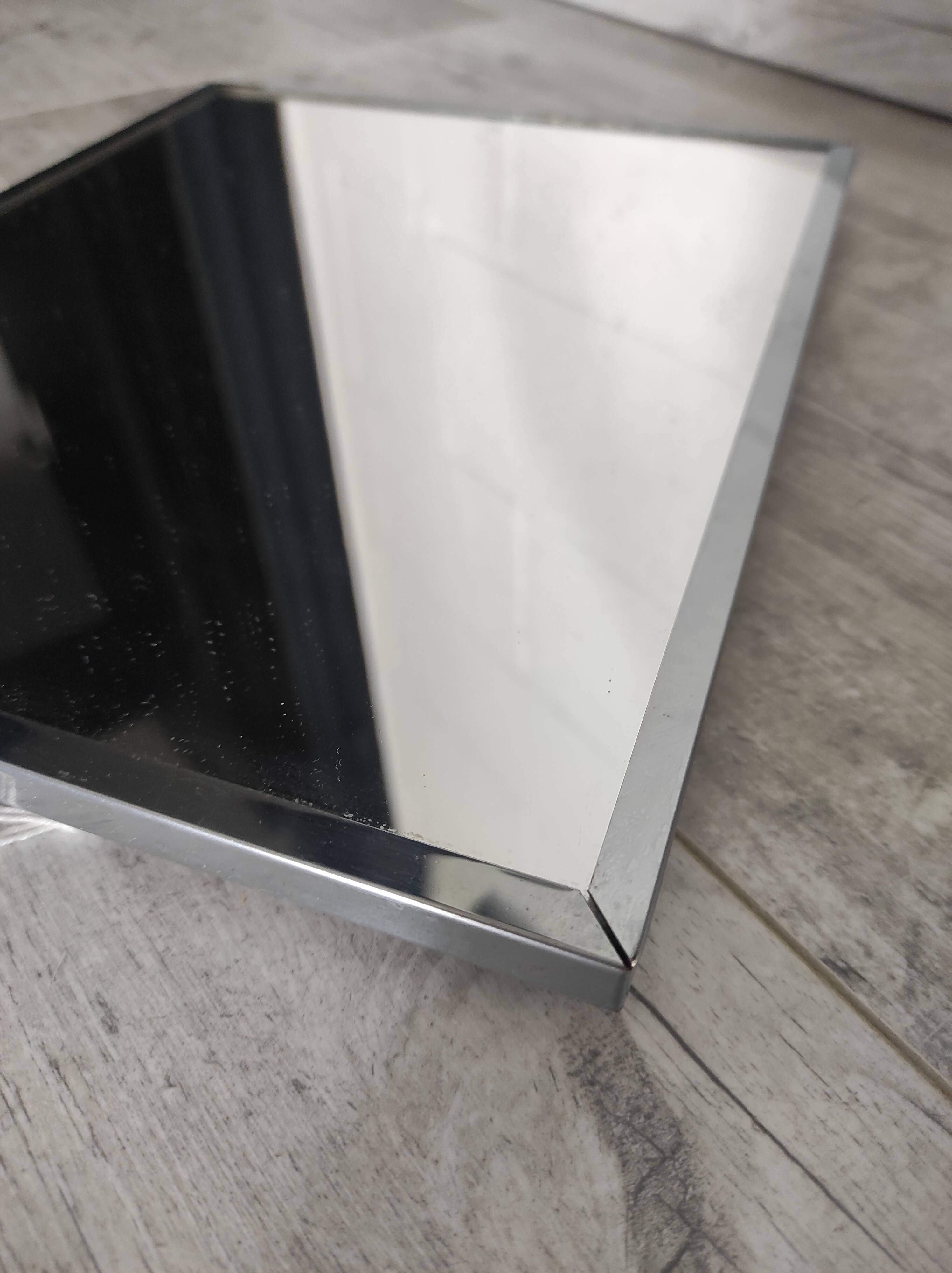 Vintage mirror with silver metal frame to hang