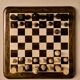 Wooden chessboard, geometric pieces