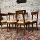 Suite of six mahogany chairs with 19th century Directoire style bands