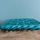 Emerald green braided slip trivet and bottle holder, knife holder