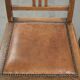 Set of 4 antique oak dining chairs in Art Nouveau style with sheepskin