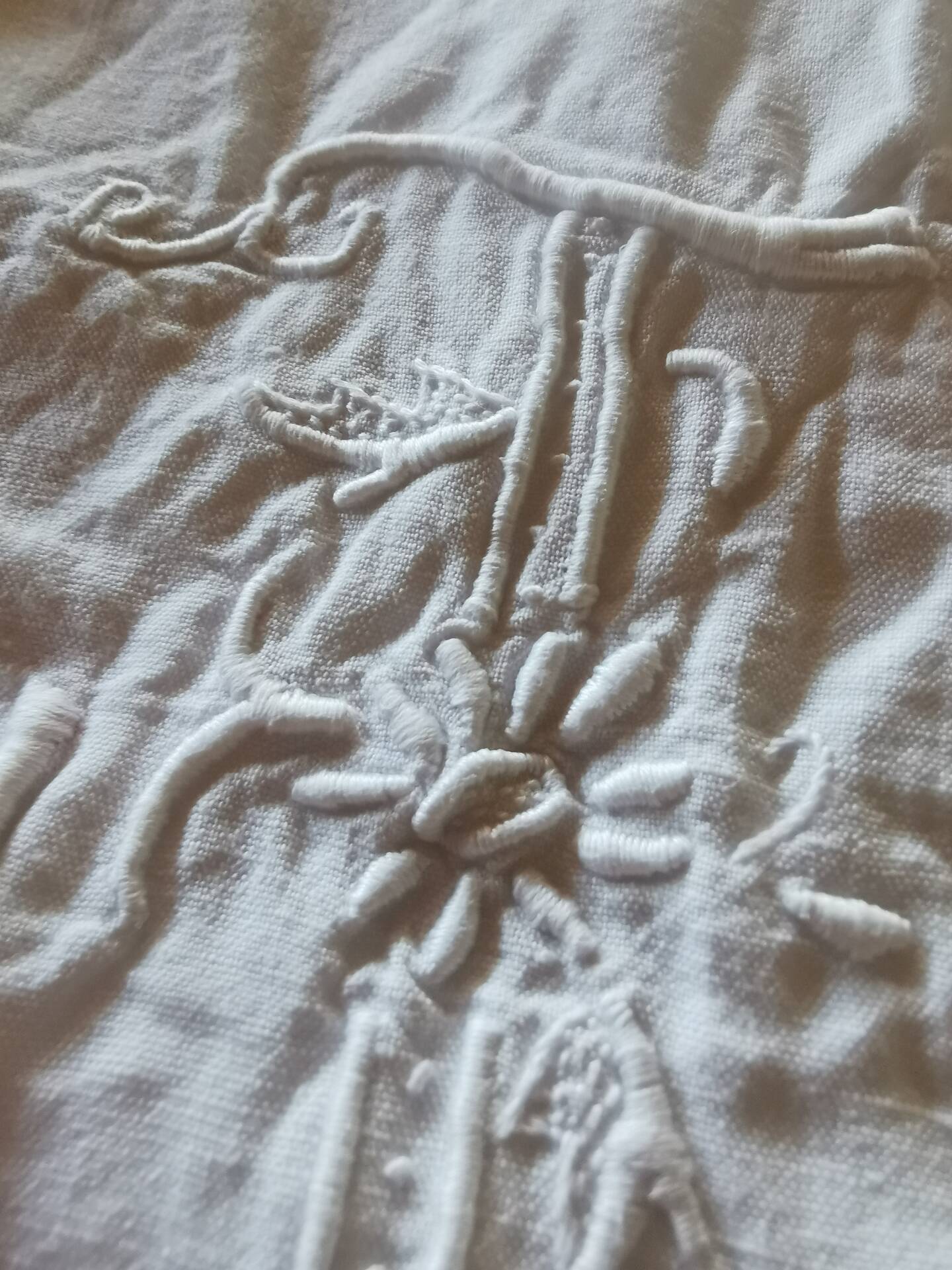 Old monogrammed fabric