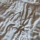 Old monogrammed fabric