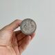 Small silver-coloured metal soliflore.