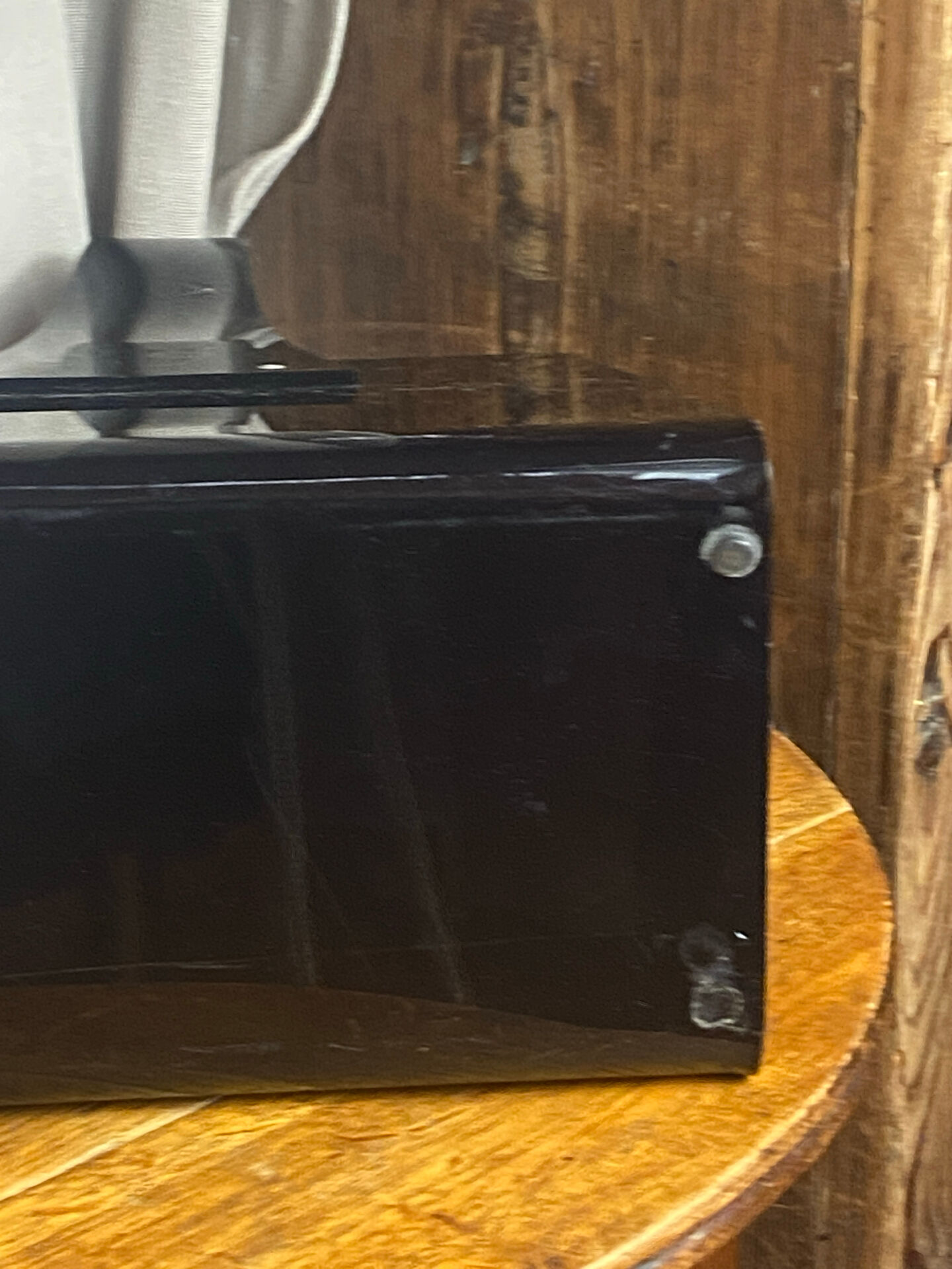 Black plexiglass magazine rack