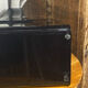 Black plexiglass magazine rack