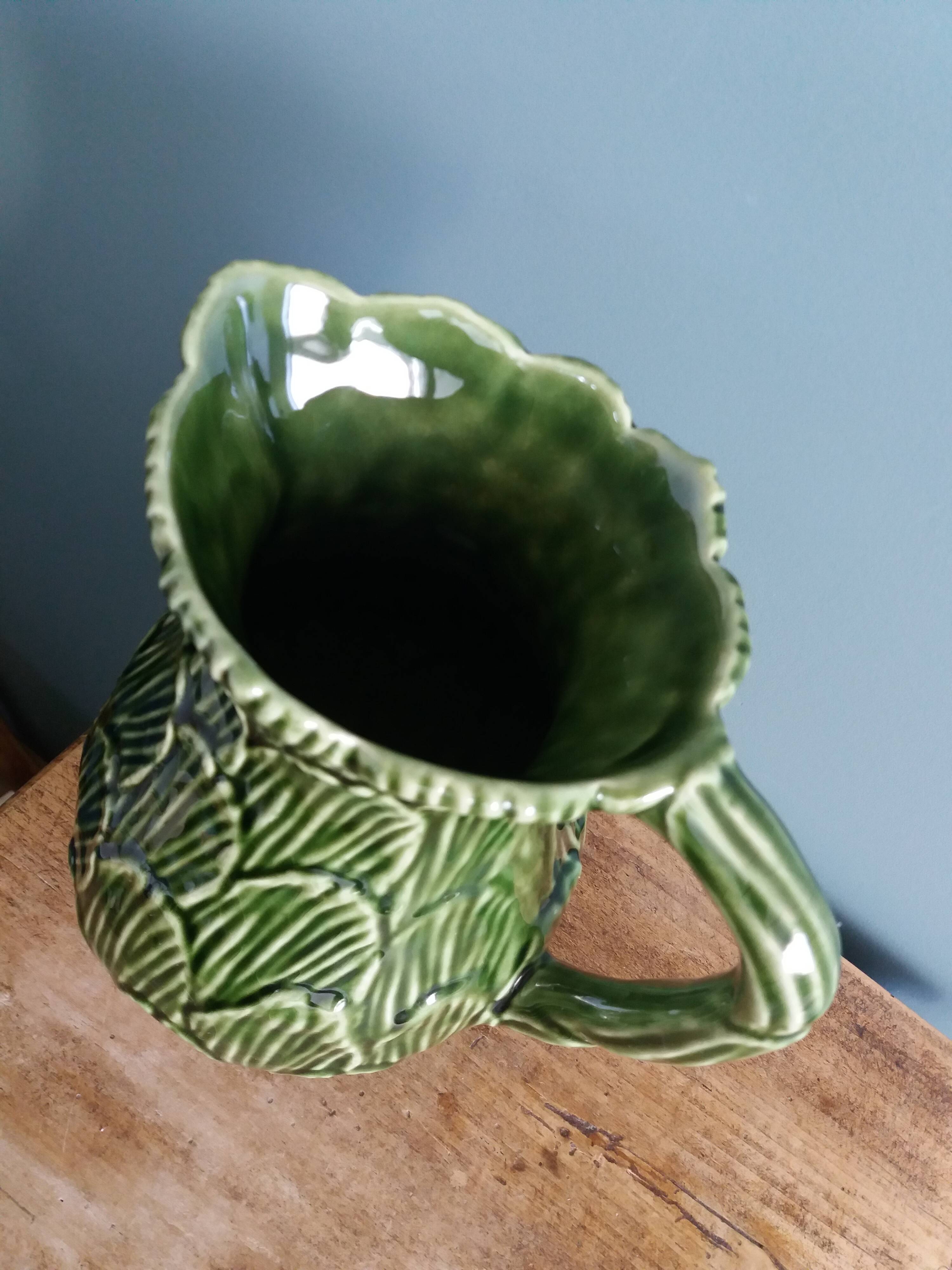 Cabbage pitcher in slip