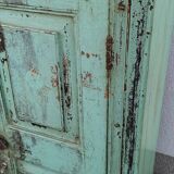 Old wooden cabinet with beautiful green patina