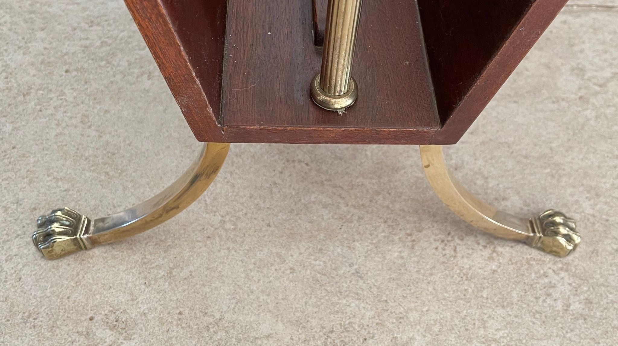 Magazine racks with claw feet by Maison Jansen