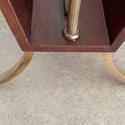 Magazine racks with claw feet by Maison Jansen