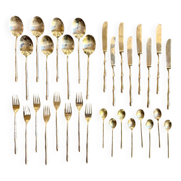 32 place settings with bamboo handles in gold metal