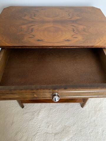 Walnut veneer pedestal table.