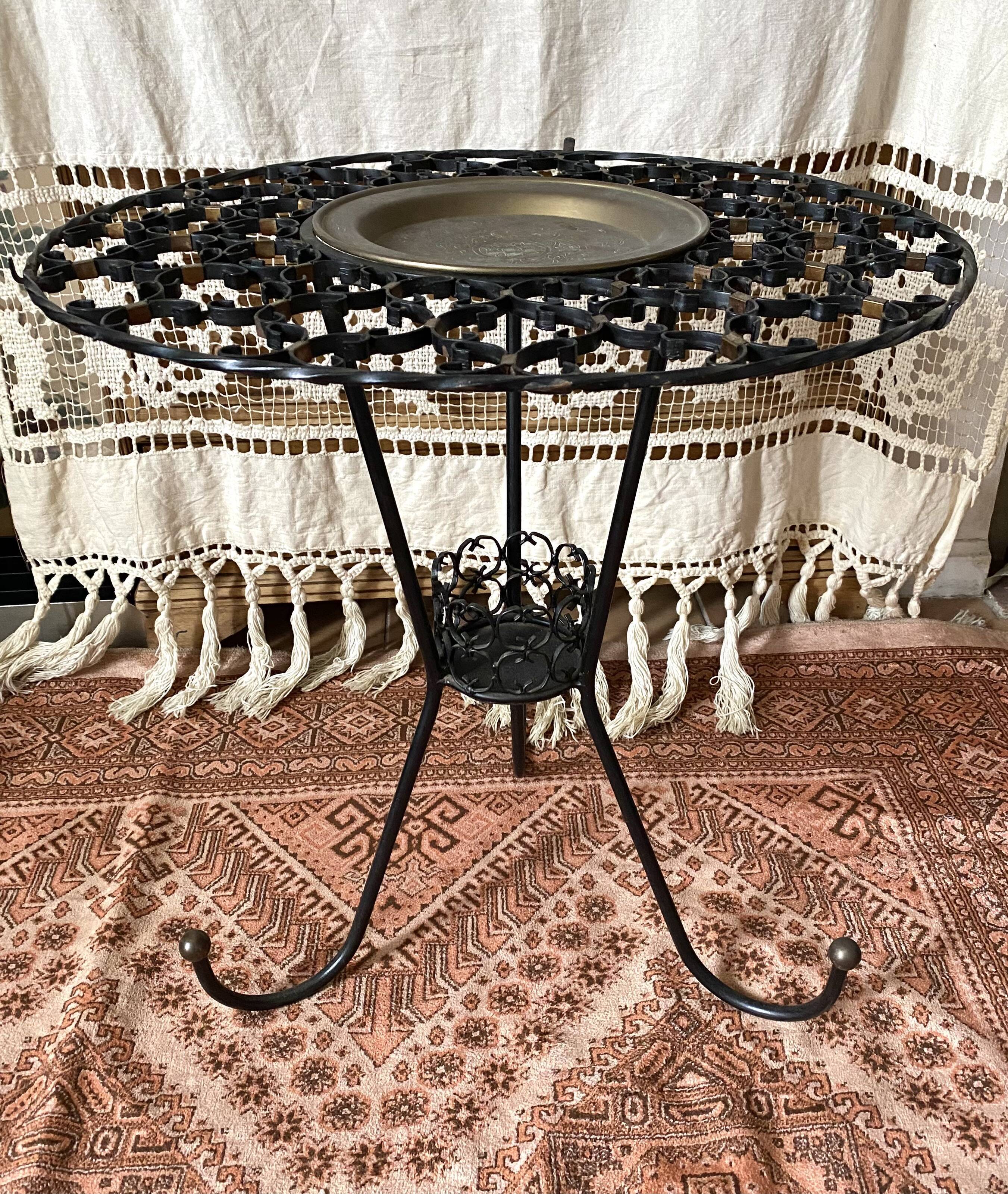 Wrought iron plant holder table from the 1950s