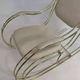 60s rocking chair in brass and ecru imitation leather