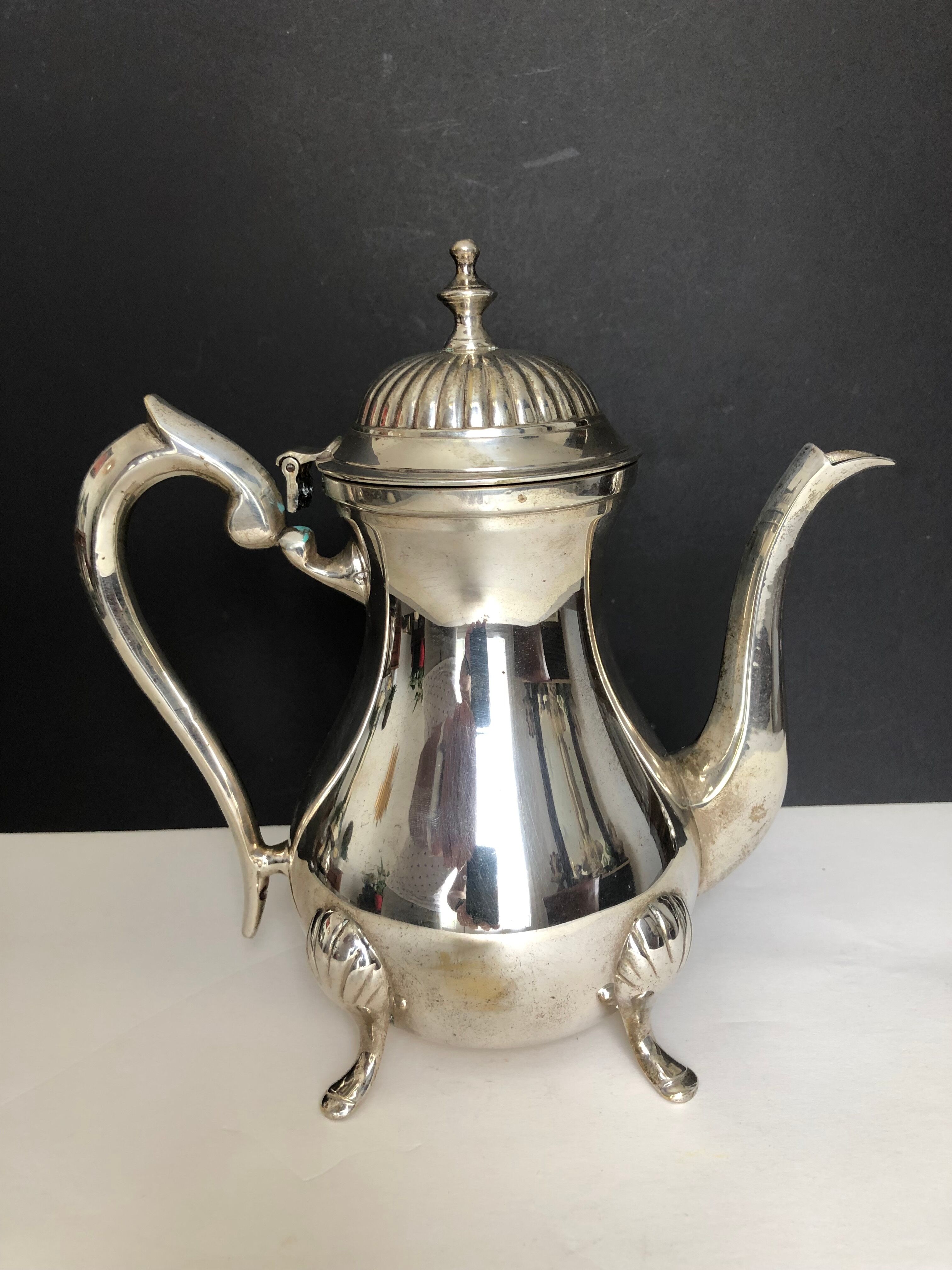 Silver metal tea and coffee service