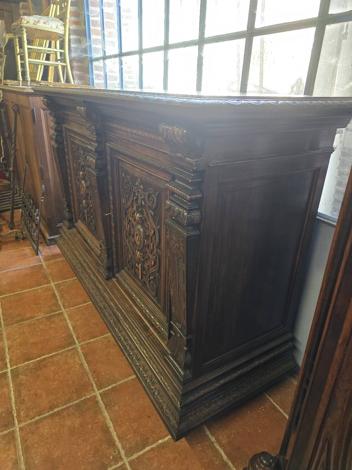 Renaissance style 2-door walnut sideboard