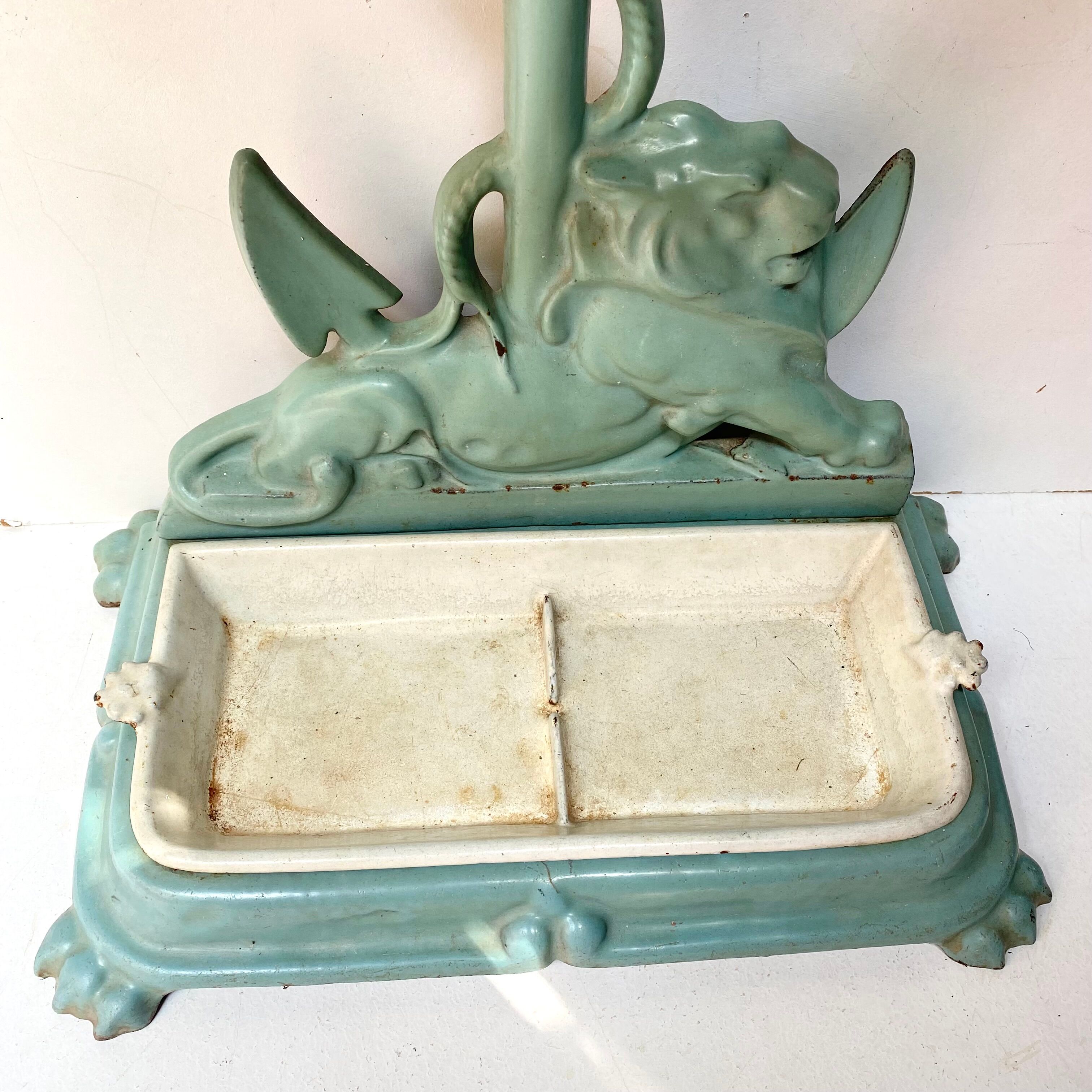Enameled cast iron umbrella stand from the early 20th century