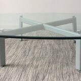 Design coffee table in beveled glass and steel foot
