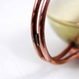 Watering can in brass and copper