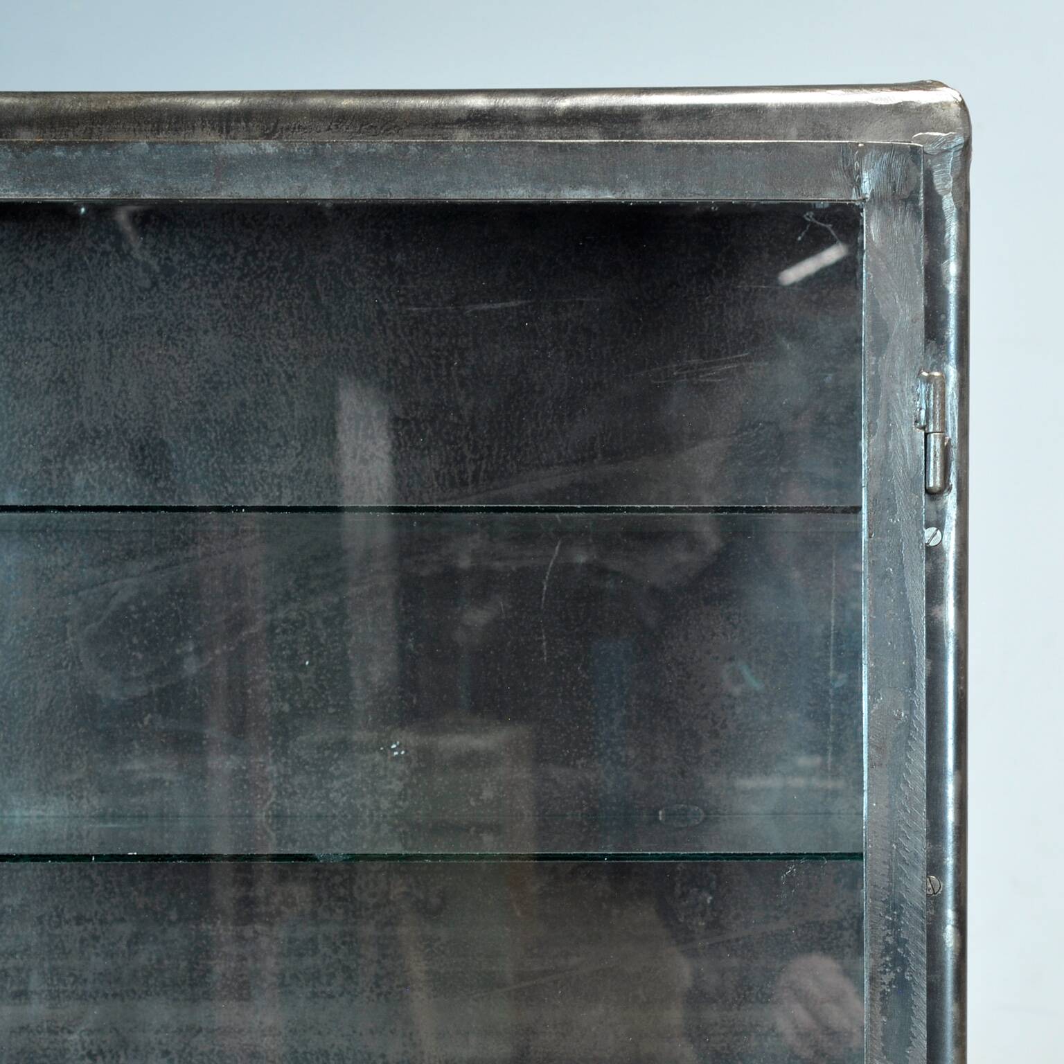 Polished iron medicine cabinet, 1950s