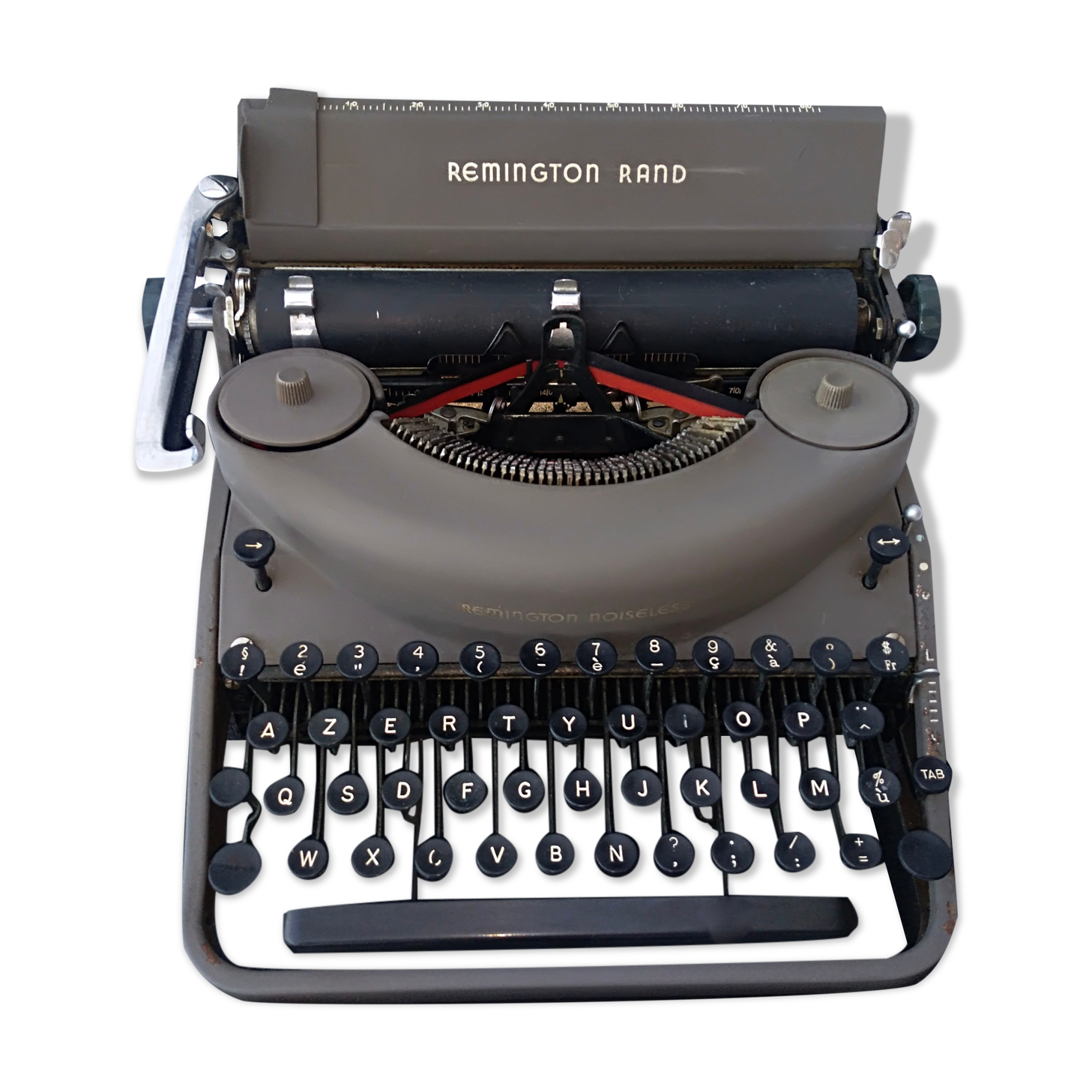 portable Remington typewriter with its suitcase and original cover