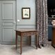 Small antique desk on wheels