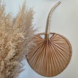 Braided palm leaf fan shape