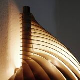 Swelling aluminum sconce by Henri Mathieu - 1970s