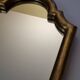 Wall mirror with a curved pediment in gilded wood, Louis-Philippe style, 44x30 cm