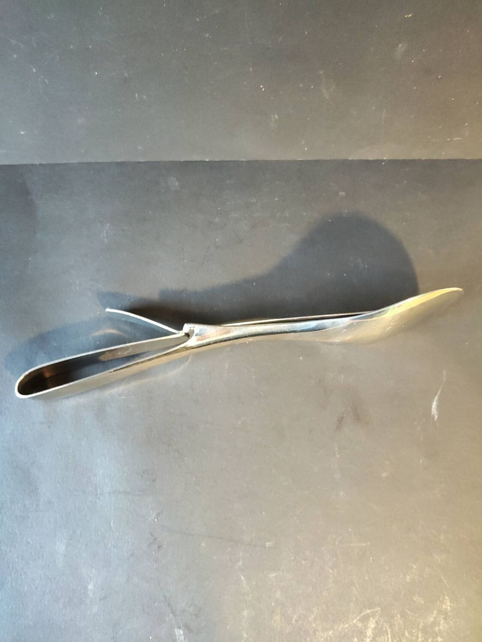 Modernist salad tongs gulden – polished stainless steel – 1970s