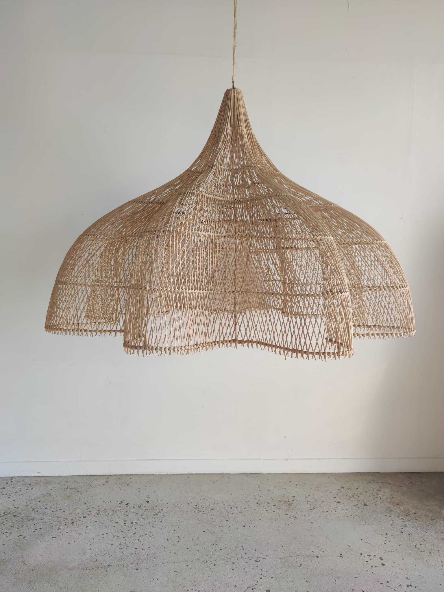 Huge rattan suspension in the shape of a corolla H:1m; D: 1m50