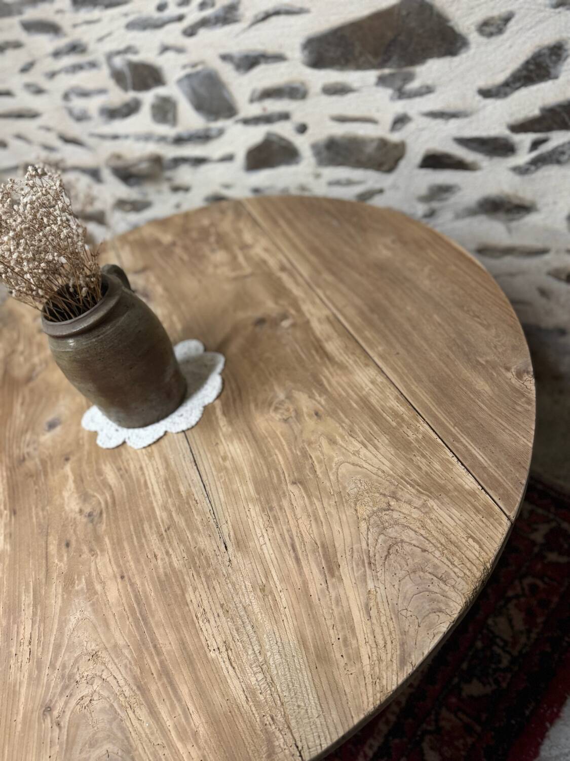 Oval coffee table in raw wood