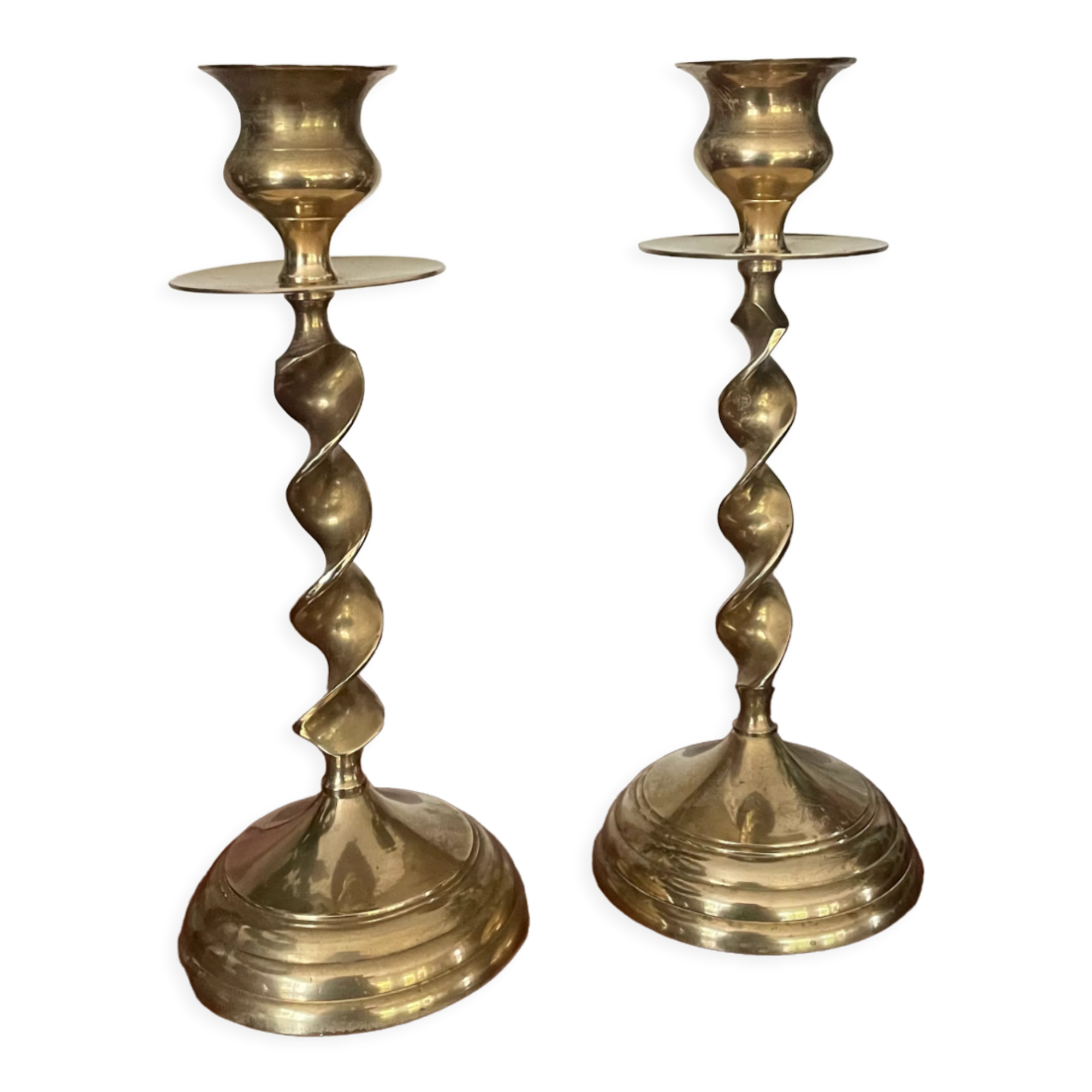 Pair of twisted brass candle holders