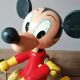 Old Mickey Mouse toy on his wooden tricycle