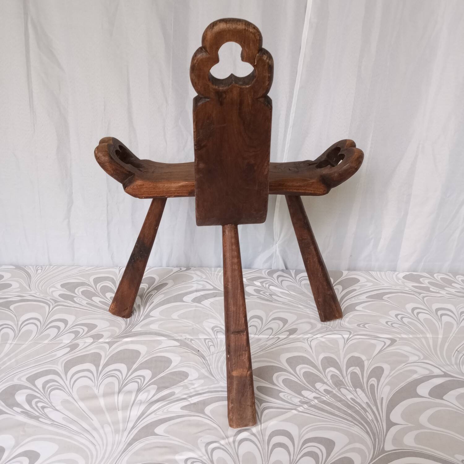 Brutalist tripod chairs in solid wood