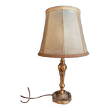 Living room lamp with golden bronze base and shade