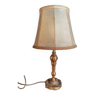 Living room lamp with golden bronze base and shade