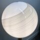 Large 1970s Italian brass floor lamp with swirled Murano glass globe — Sculptura
