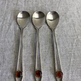 Art Nouveau metal and amber spoons