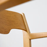 Wooden chair with armrests