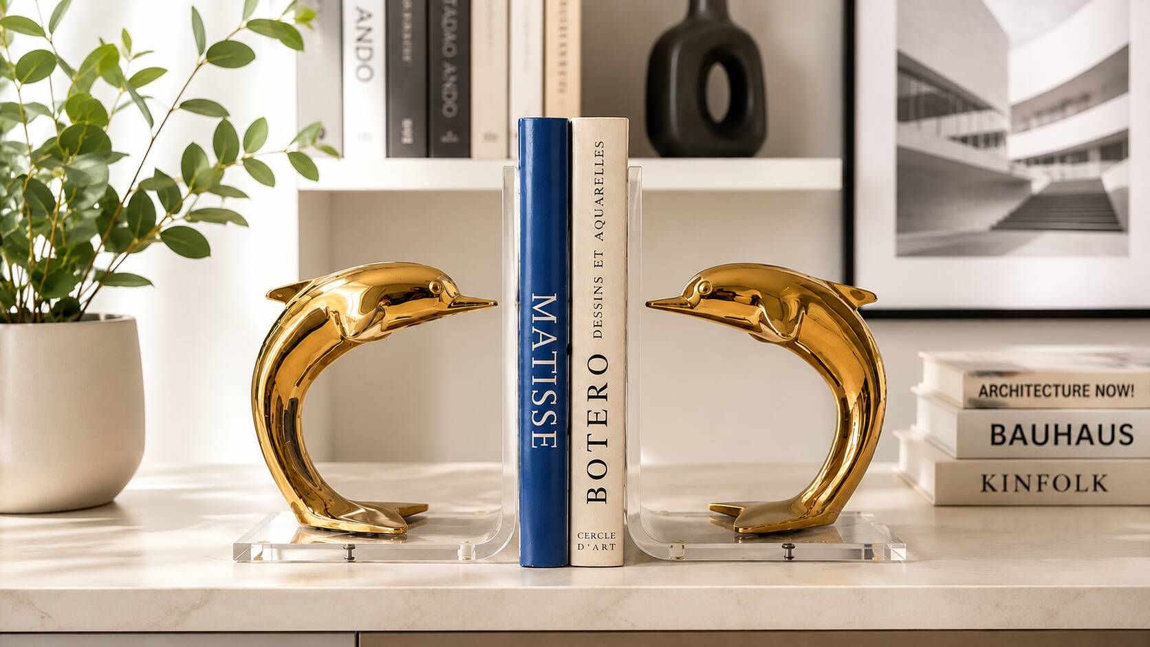Dolphin bookends in gold metal and plexiglass – 1980s